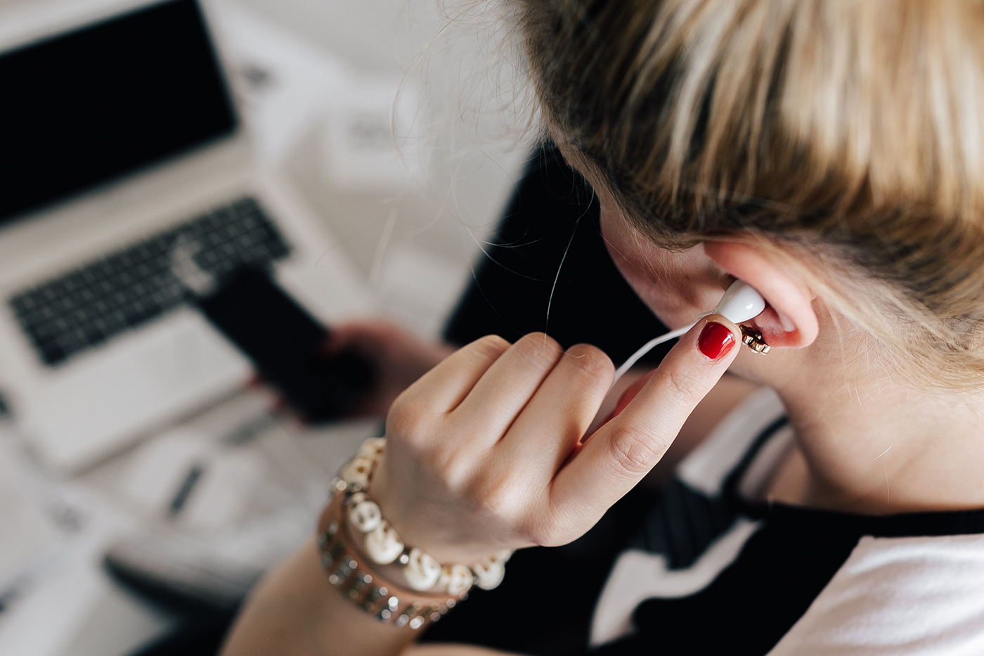Woman listening to podcast